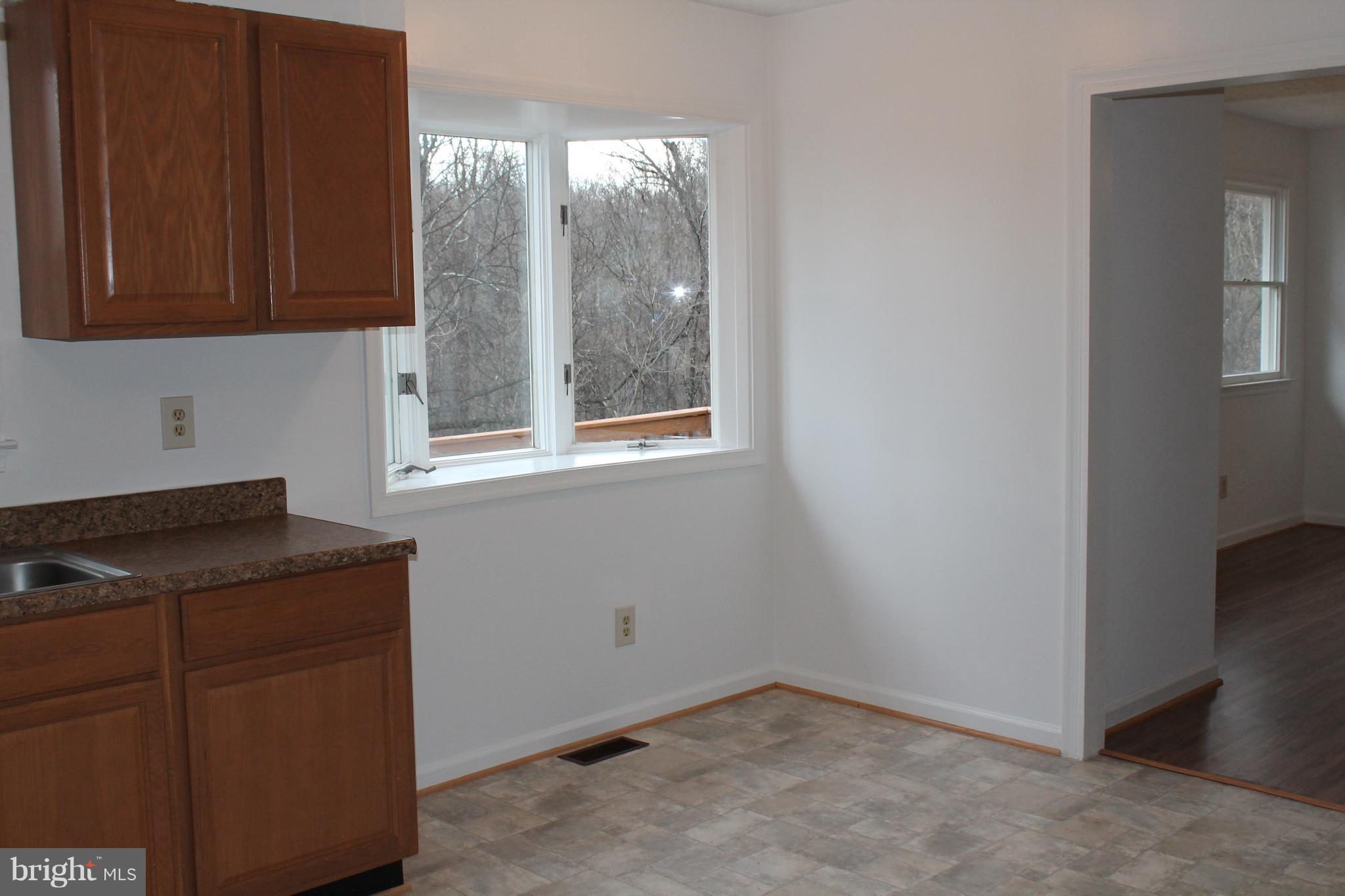 44 Hickory Tree Road Front Royal, VA 22630 - Photo 11 of 30 a room with cabinet and window