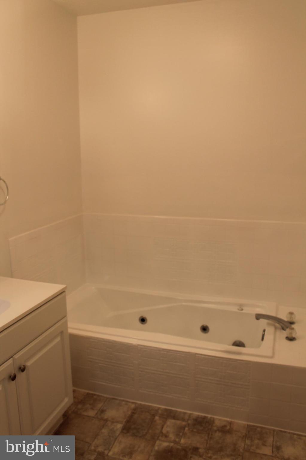 44 Hickory Tree Road Front Royal, VA 22630 - Photo 18 of 30 a bathroom with a bathtub and a shower