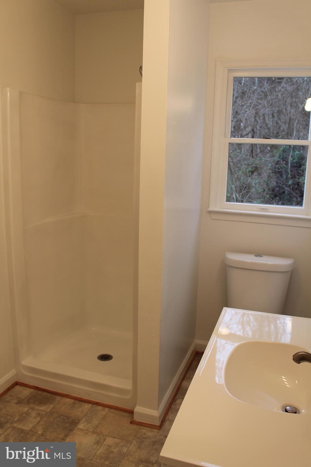 44 Hickory Tree Road Front Royal, VA 22630 - Photo 19 of 30 a bathroom with a tub and window