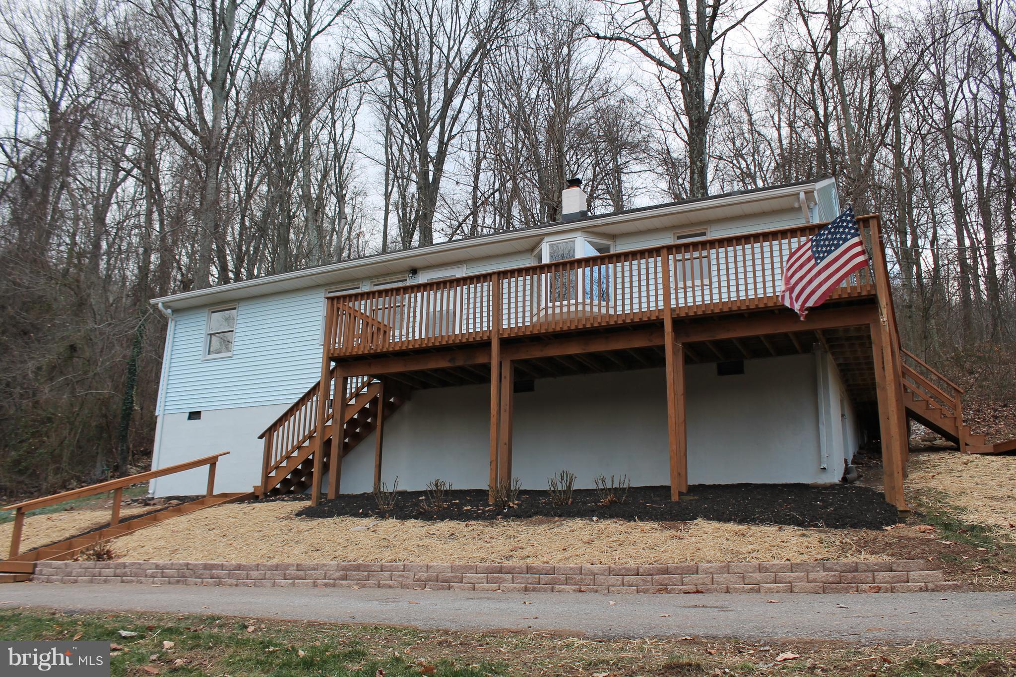 44 Hickory Tree Road Front Royal, VA 22630 - Photo 28 of 30 a view of a house with a yard
