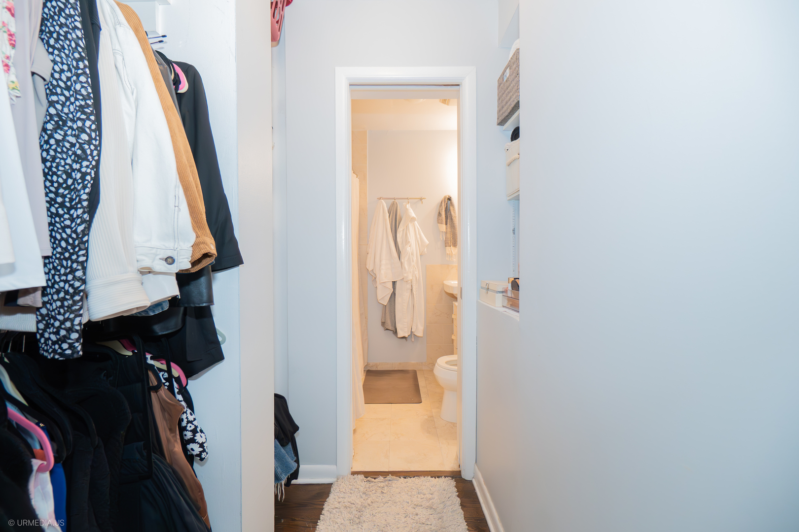 2201 North Cleveland Avenue, Unit 306 Chicago, IL 60614 - Photo 15 of 22 a view of walk in closet with clothes and shoes