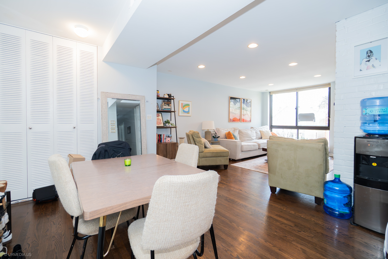 2201 North Cleveland Avenue, Unit 306 Chicago, IL 60614 - Photo 7 of 22 a living room with furniture and a wooden floor