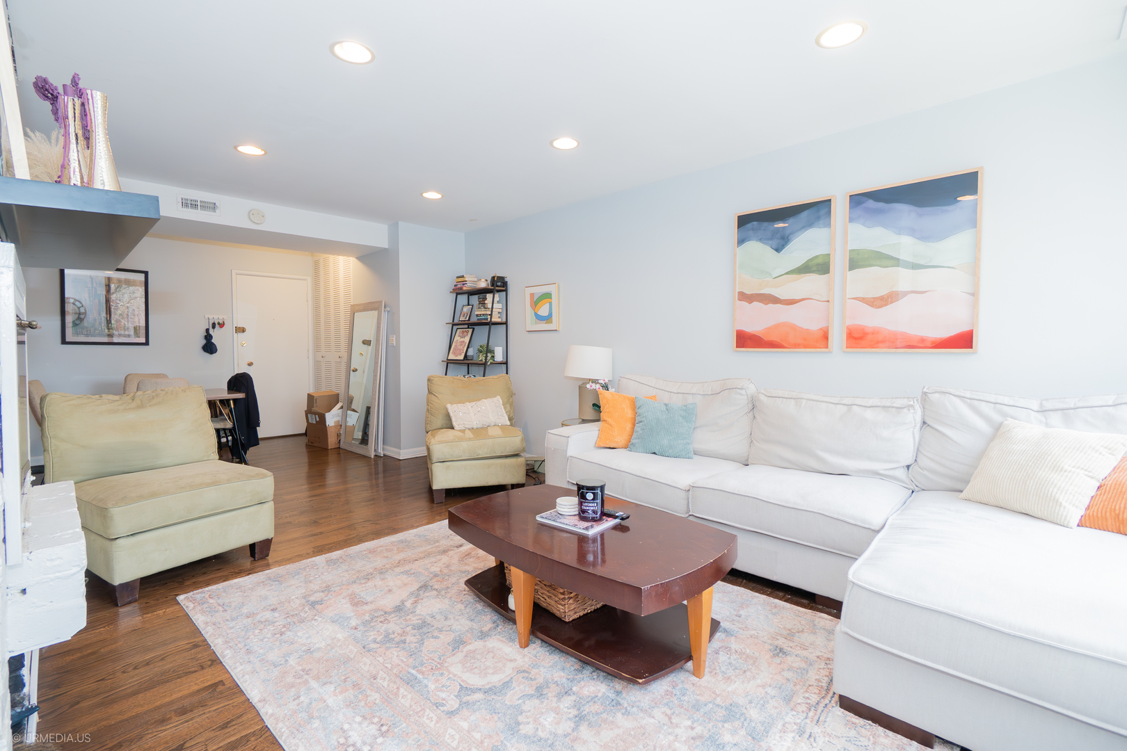 2201 North Cleveland Avenue, Unit 306 Chicago, IL 60614 - Photo 8 of 22 a living room with furniture and a wooden floor