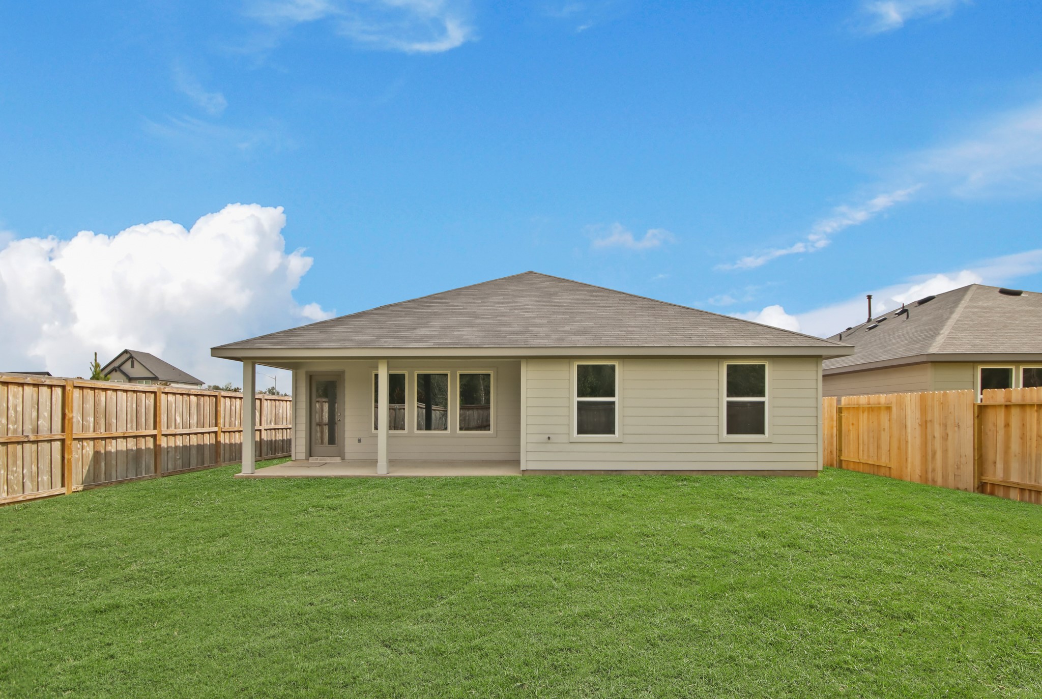 4323 Multnomah Falls Conroe, TX 77303 - Photo 14 of 25 a view of a house with a backyard