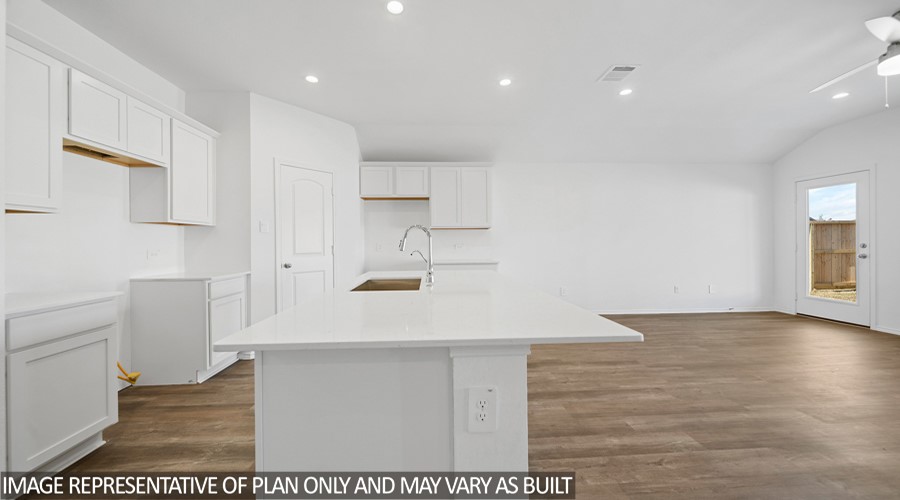 4323 Multnomah Falls Conroe, TX 77303 - Photo 3 of 25 a view of kitchen with furniture and wooden floor