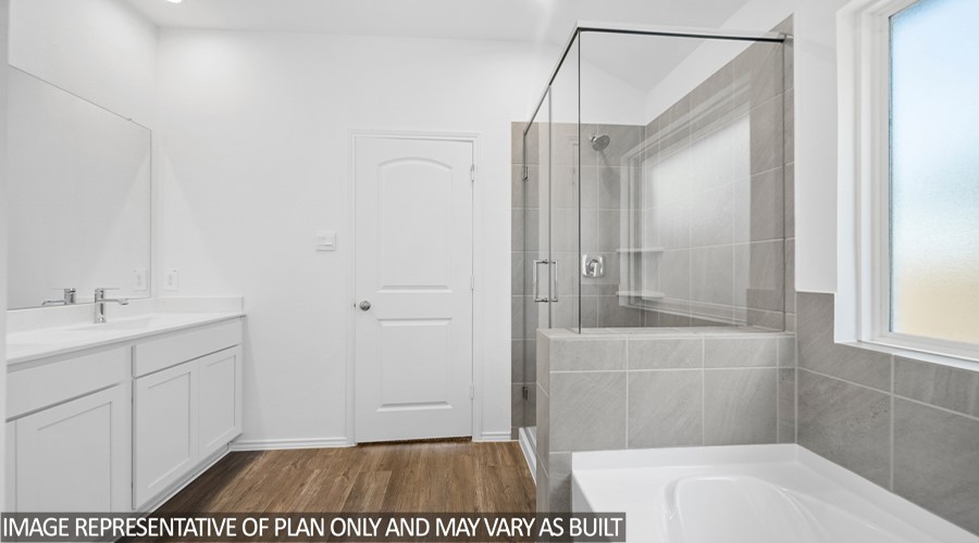 4323 Multnomah Falls Conroe, TX 77303 - Photo 10 of 25 a bathroom with a shower and a sink