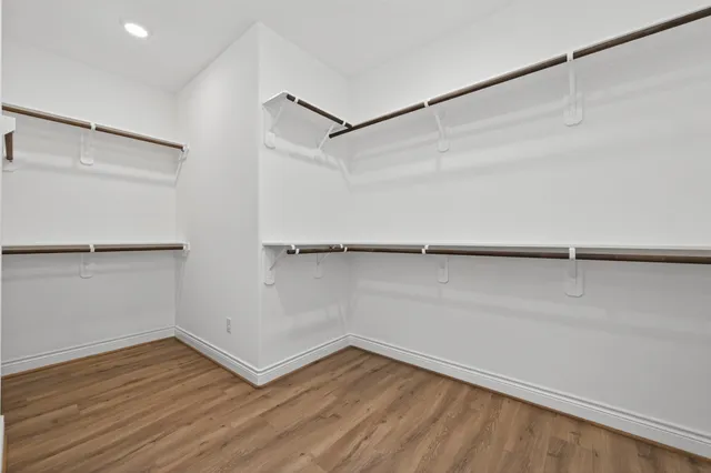 a view of an empty walk in closet
