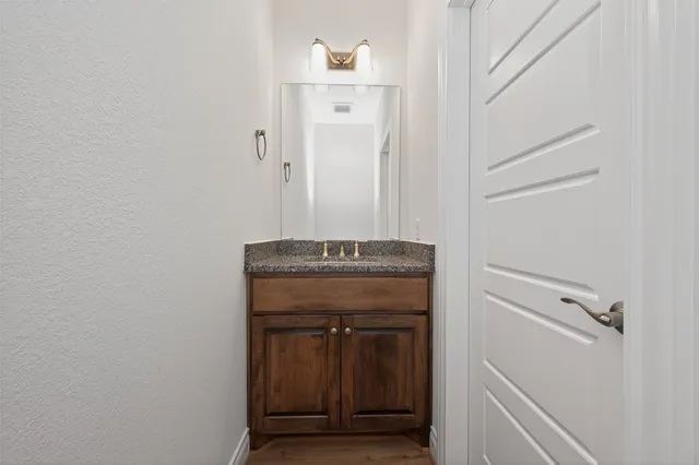 a view of a hallway with washer and dryer