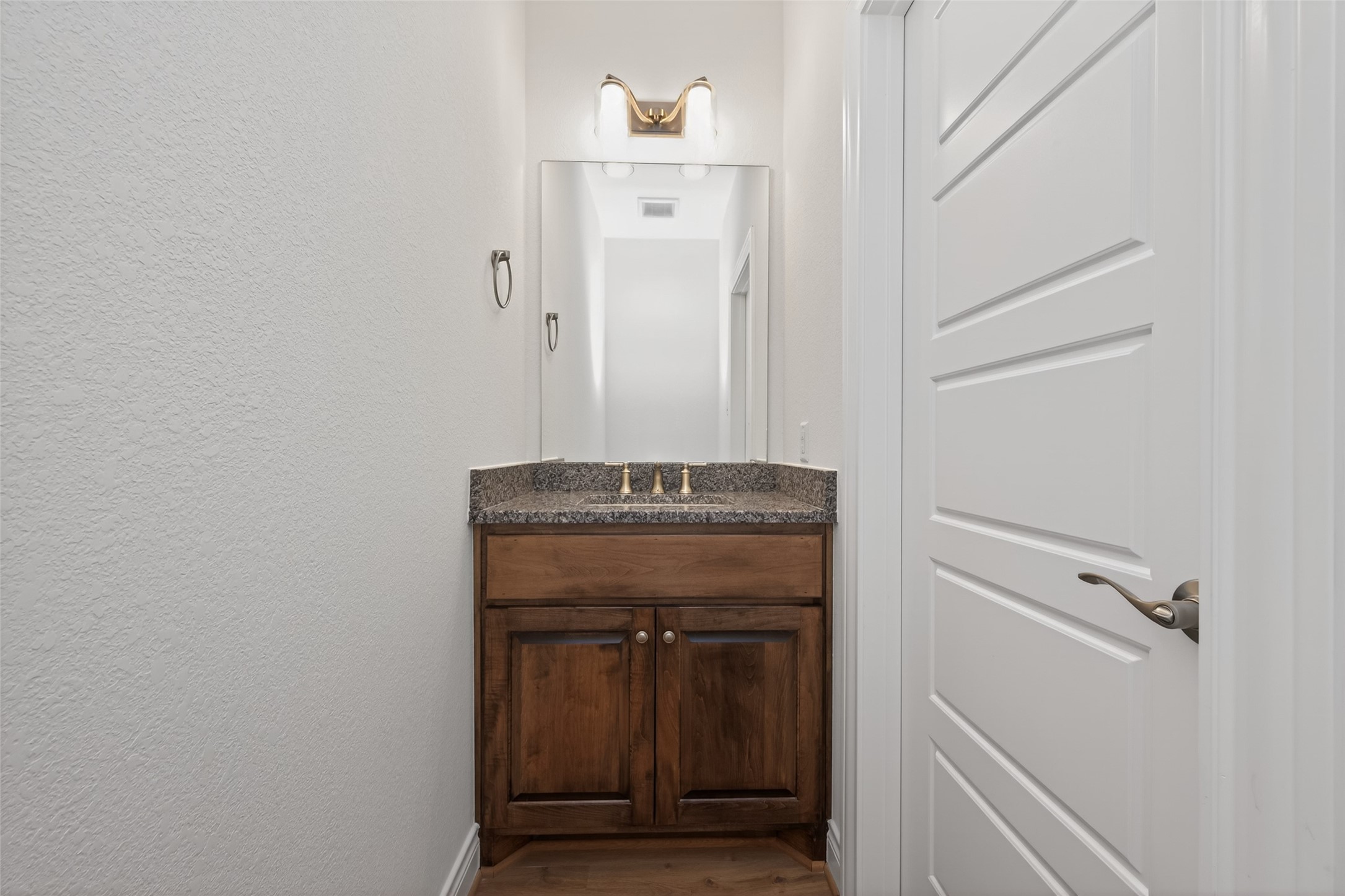 12879 Oak Barrel Road Willis, TX 77378 - Photo 22 of 37 a view of a hallway with washer and dryer