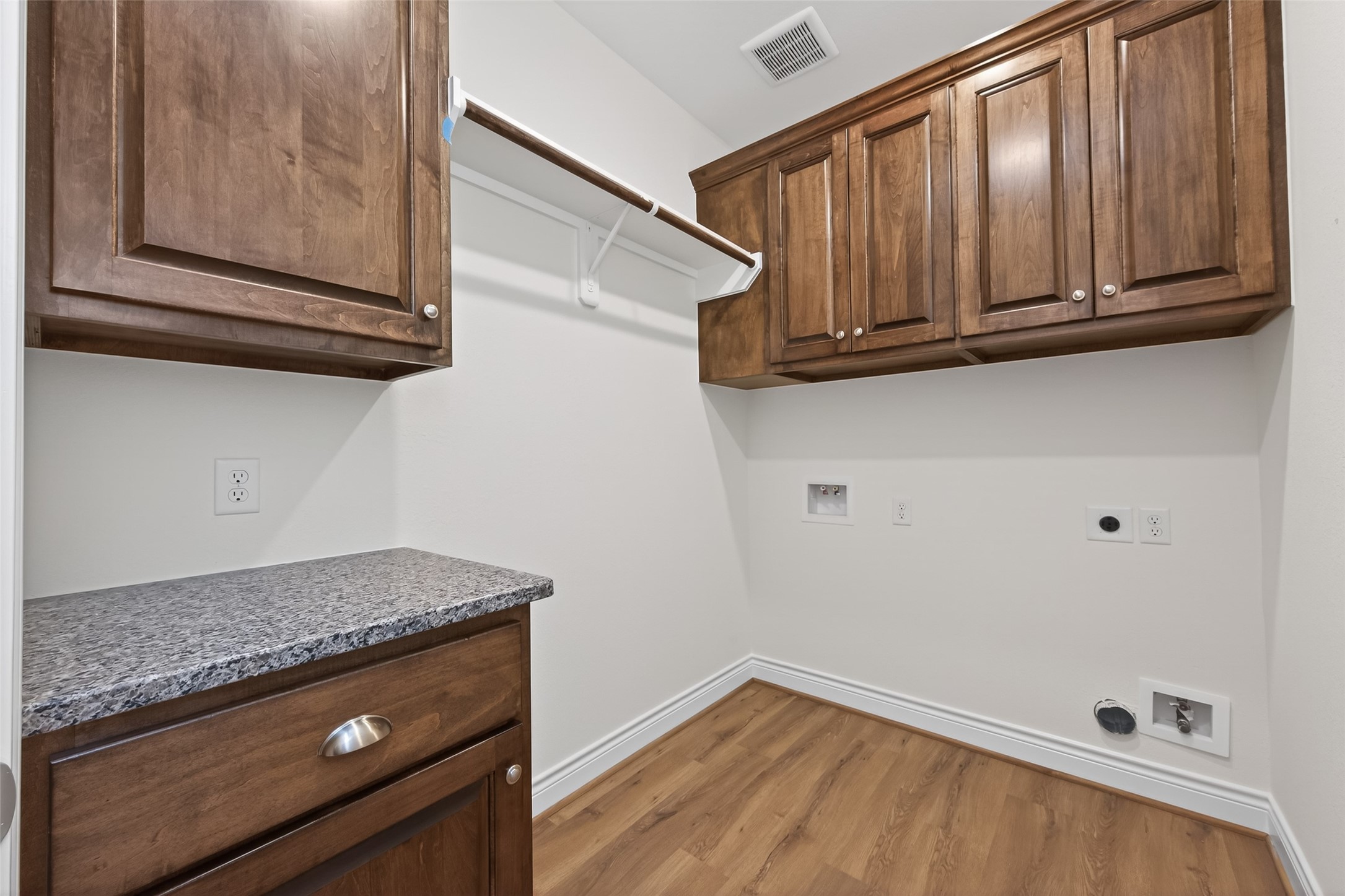 12879 Oak Barrel Road Willis, TX 77378 - Photo 23 of 37 a view of a kitchen with wooden cabinet