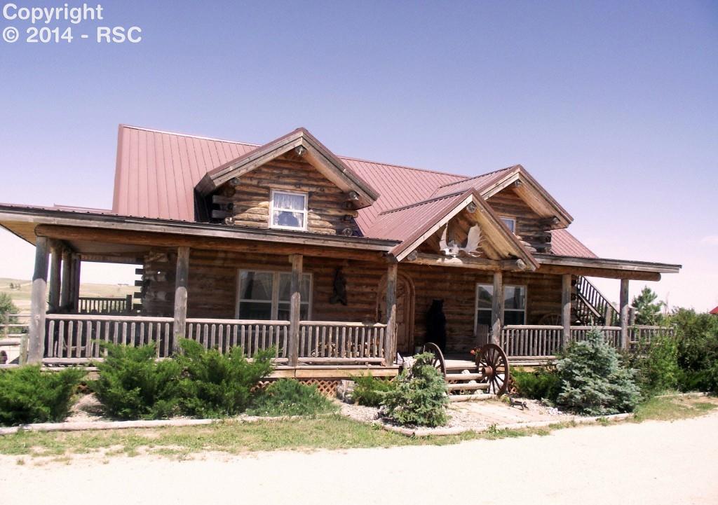 14475 Yoder Road Calhan, CO 80808 - Photo 1 of 7 Have you always dreamed of living in a real log home? Well, welcome home!