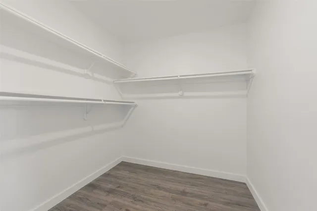 a view of an empty walk in closet
