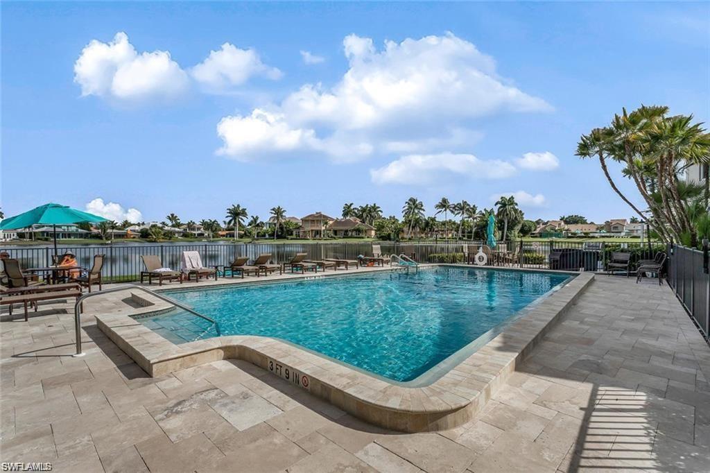4170 Crayton Road, Unit C3 Naples, FL 34103 - Photo 1 of 20 Swan Lake---great pool setting