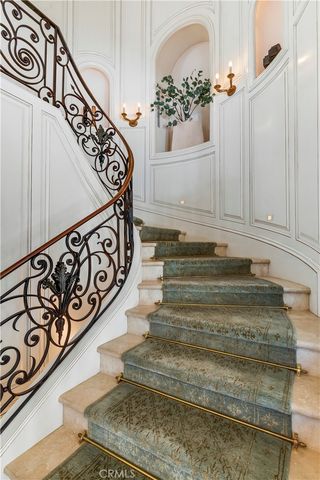 a bedroom with furniture and a fireplace