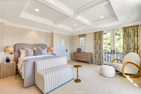 a bedroom with a bed and window with outer view