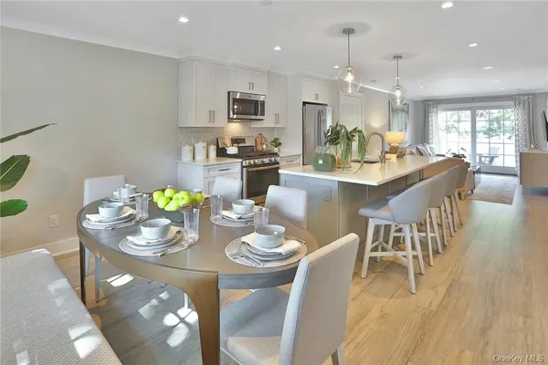 a view of a dining room with furniture