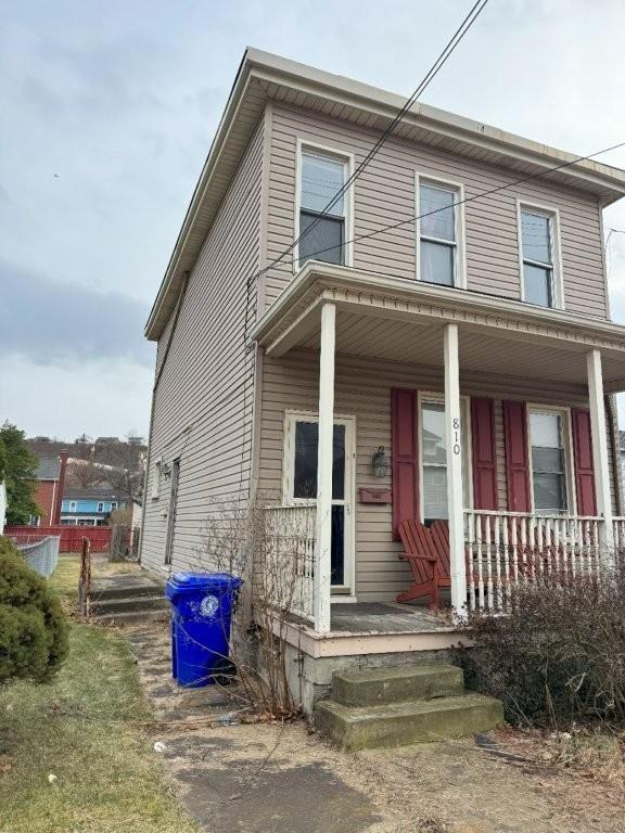 810 Indiana Avenue Monaca, PA 15061 - Photo 4 of 5 a front view of a house with a garden