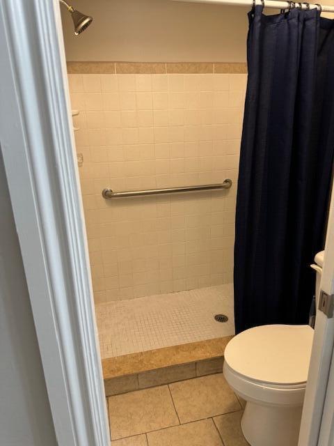 6014 Indrio Road, Unit F2 Fort Pierce, FL 34951 - Photo 16 of 27 a bathroom with a toilet and a shower