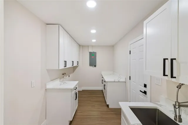 a view of a swimming pool with sitting area