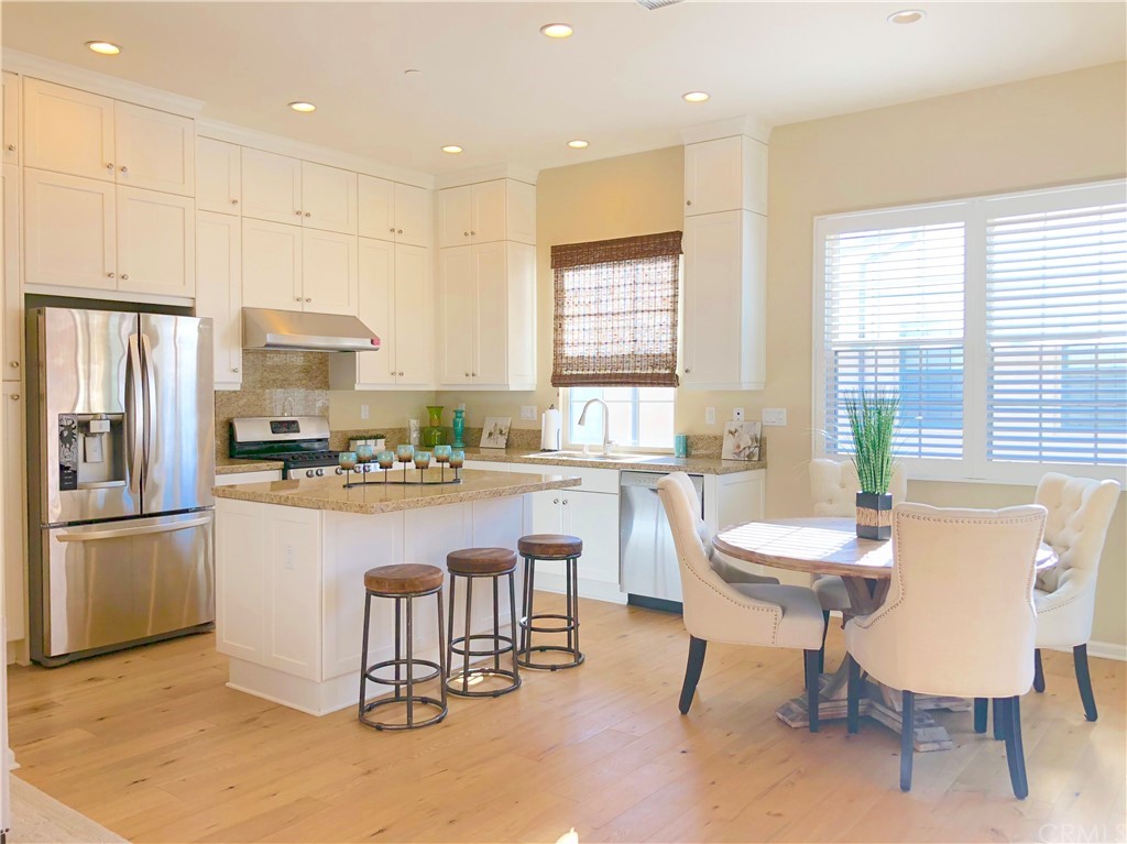 222 Firefly Irvine, CA 92618 - Photo 2 of 26 a kitchen with stainless steel appliances granite countertop a stove a sink a refrigerator and a refrigerator