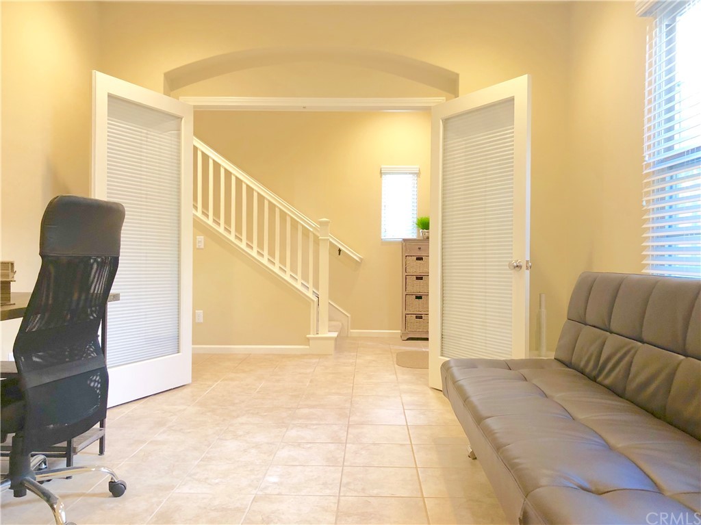 222 Firefly Irvine, CA 92618 - Photo 12 of 26 a view of a livingroom with furniture and stairs