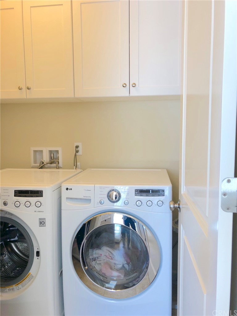 222 Firefly Irvine, CA 92618 - Photo 15 of 26 a utility room with dryer and washer