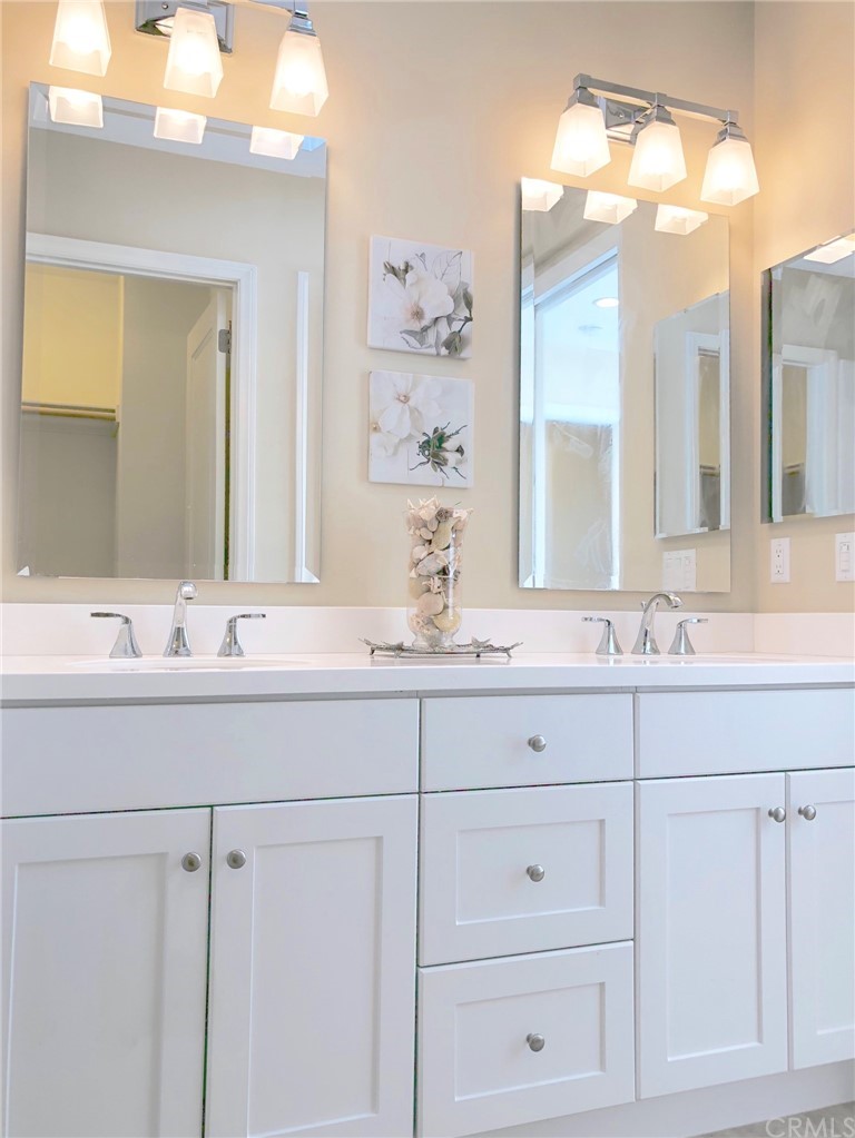 222 Firefly Irvine, CA 92618 - Photo 21 of 26 a bathroom with vanity mirror and sink