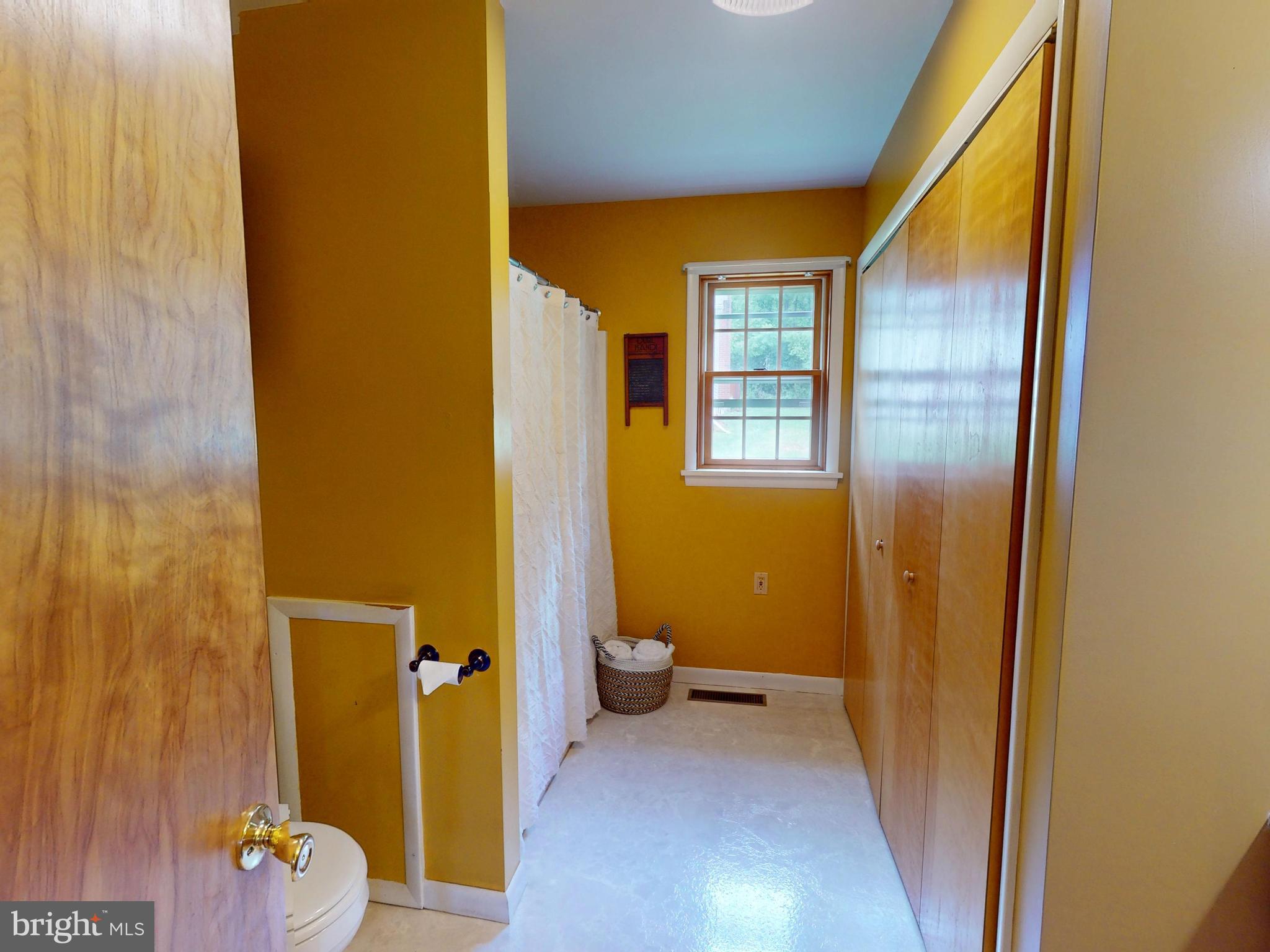 129 Walker Drive Spring Mills, PA 16875 - Photo 18 of 29 a view of a hallway with wooden shelves
