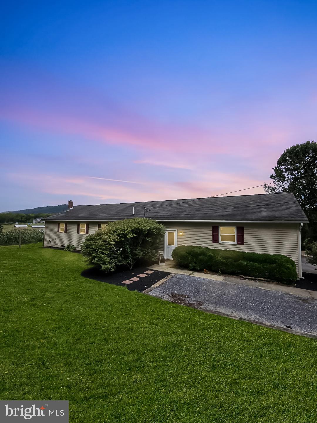 129 Walker Drive Spring Mills, PA 16875 - Photo 21 of 29 a view of a backyard with a garden