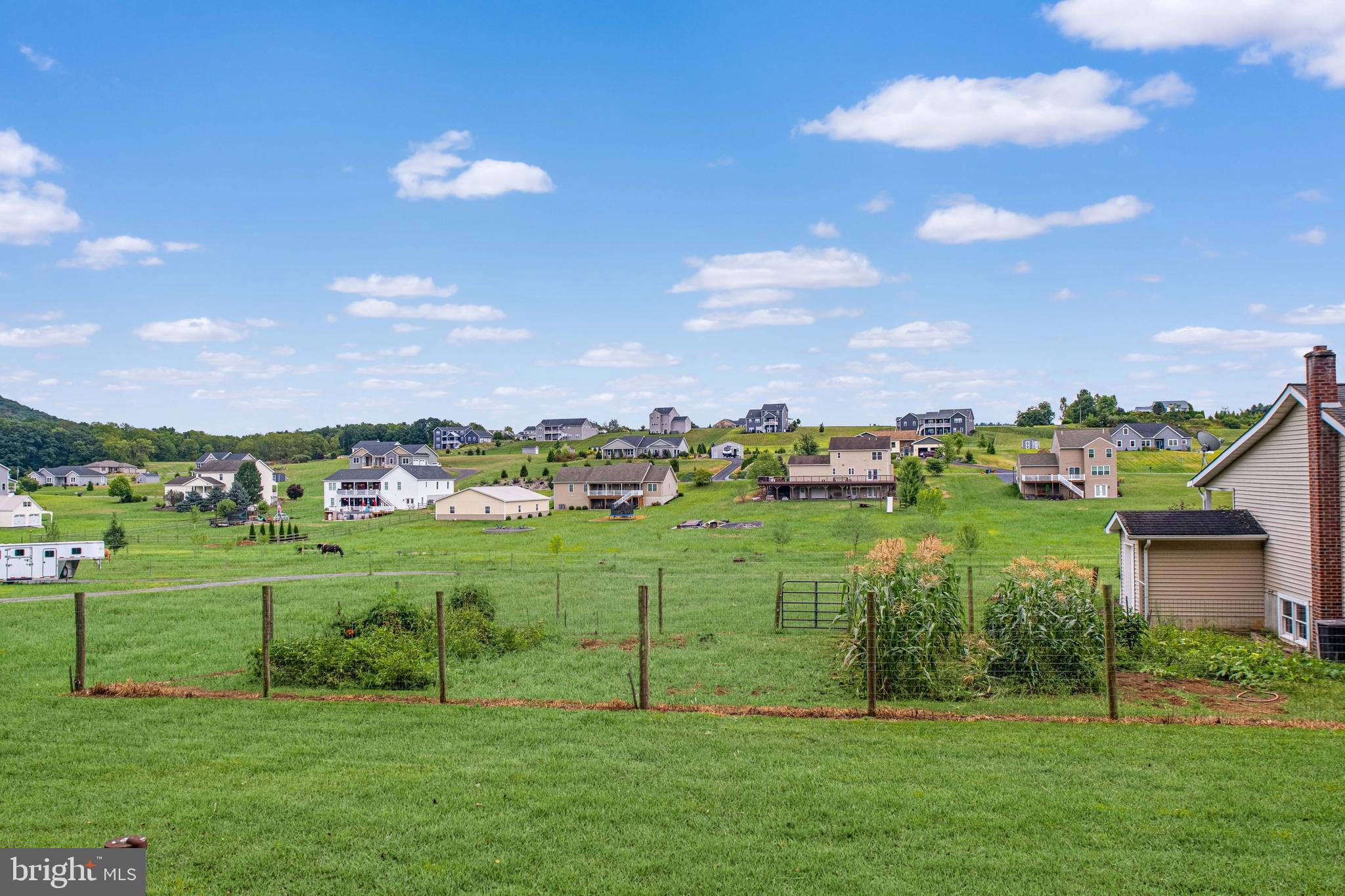 129 Walker Drive Spring Mills, PA 16875 - Photo 24 of 29 a view of a golf course with a house