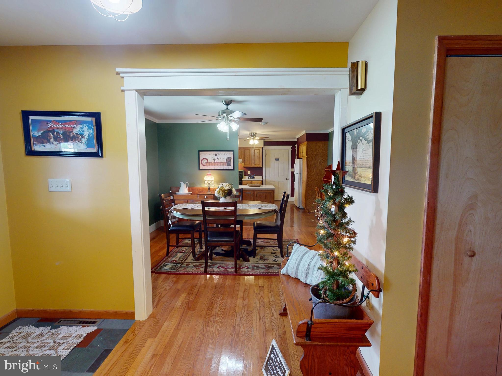 129 Walker Drive Spring Mills, PA 16875 - Photo 4 of 29 a view of a dining room with furniture and wooden floor