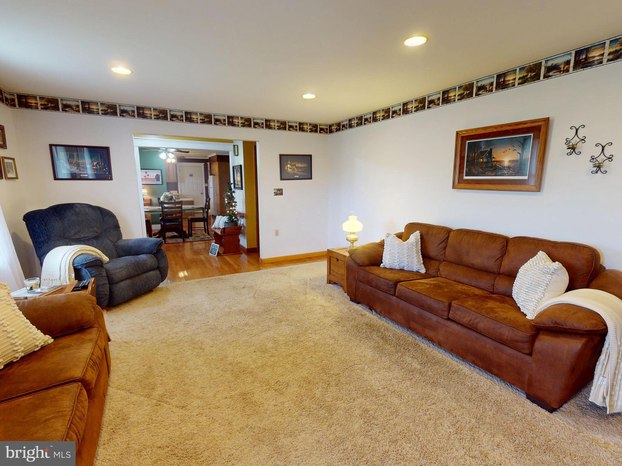 129 Walker Drive Spring Mills, PA 16875 - Photo 6 of 29 a living room with furniture and a lamp
