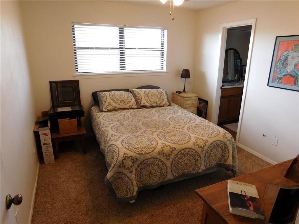 410 Barnes Bridge Road Sunnyvale, TX 75182 - Photo 7 of 20 a bedroom with a bed and a window