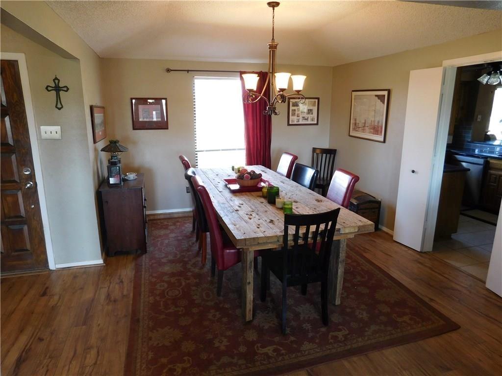 410 Barnes Bridge Road Sunnyvale, TX 75182 - Photo 8 of 20 a view of a dining room with furniture window and wooden floor