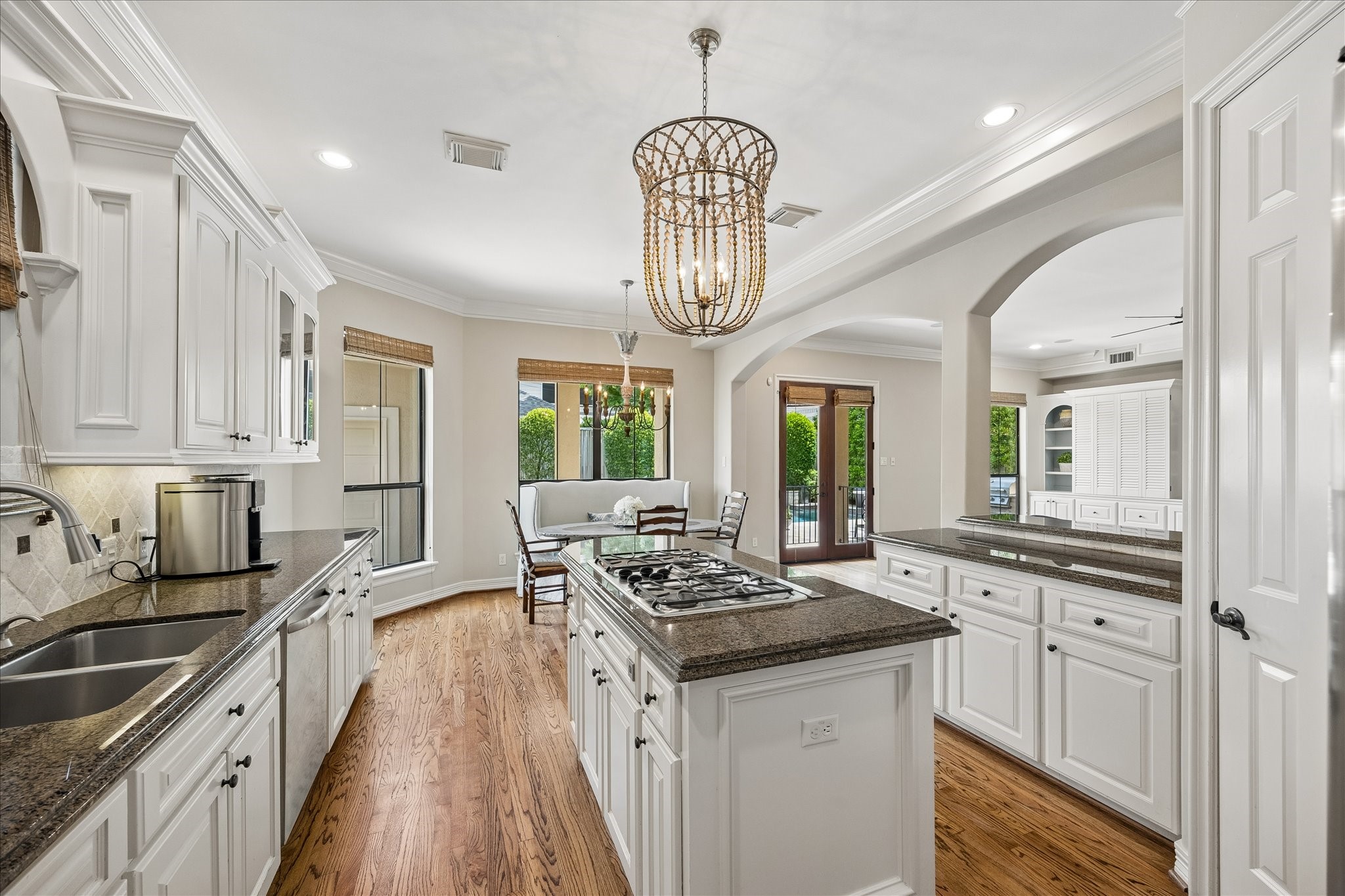 802 Anderson Street Bellaire, TX 77401 - Photo 12 of 36 This kitchen is a great space to gather and is open to the family room.