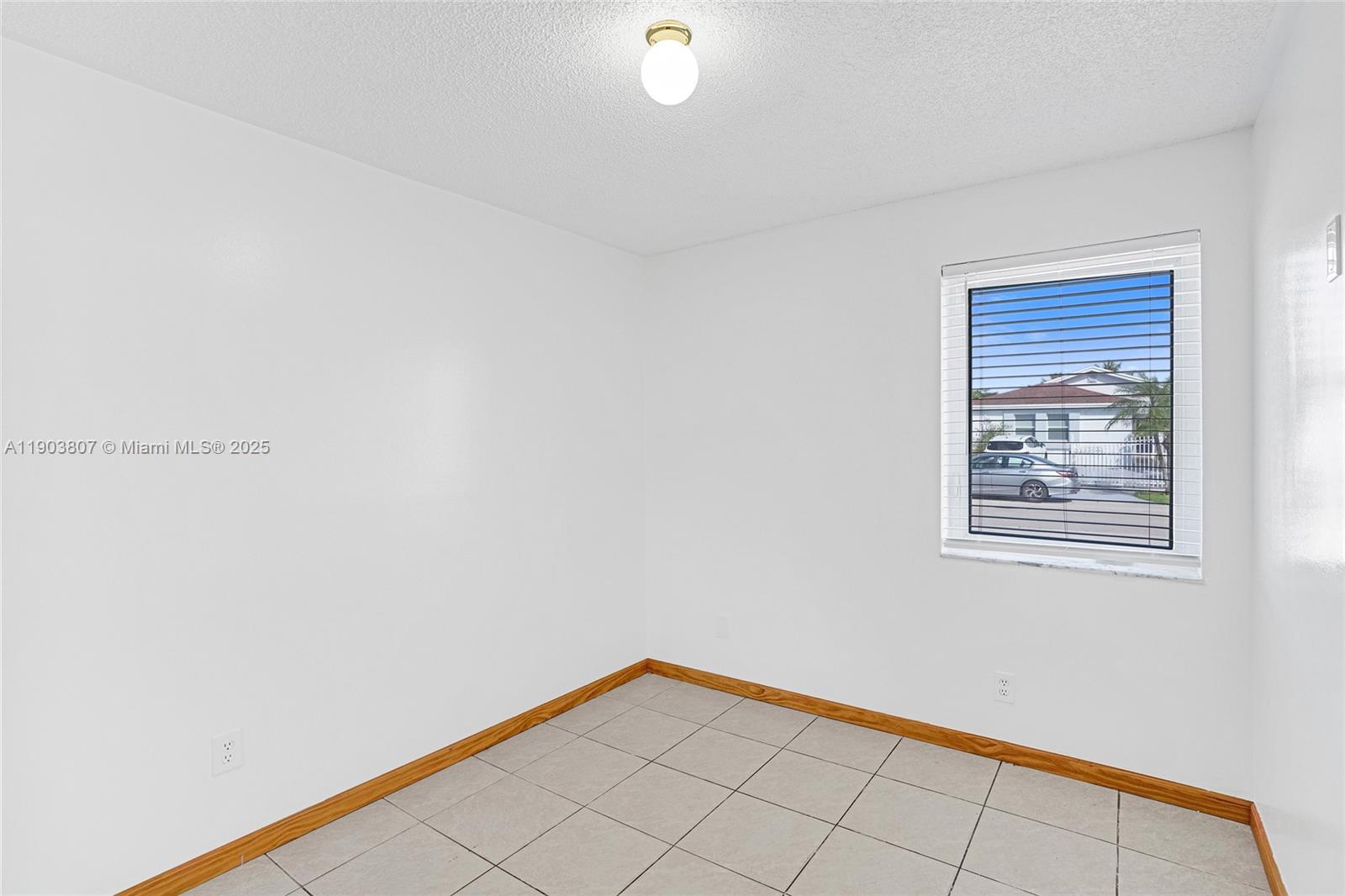 11482 Southwest 181st Street Miami, FL 33157 - Photo 12 of 35 a view of an empty room