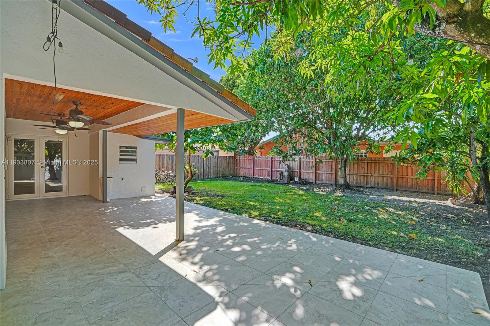 11482 Southwest 181st Street Miami, FL 33157 - Photo 26 of 35 a view of a house with a yard