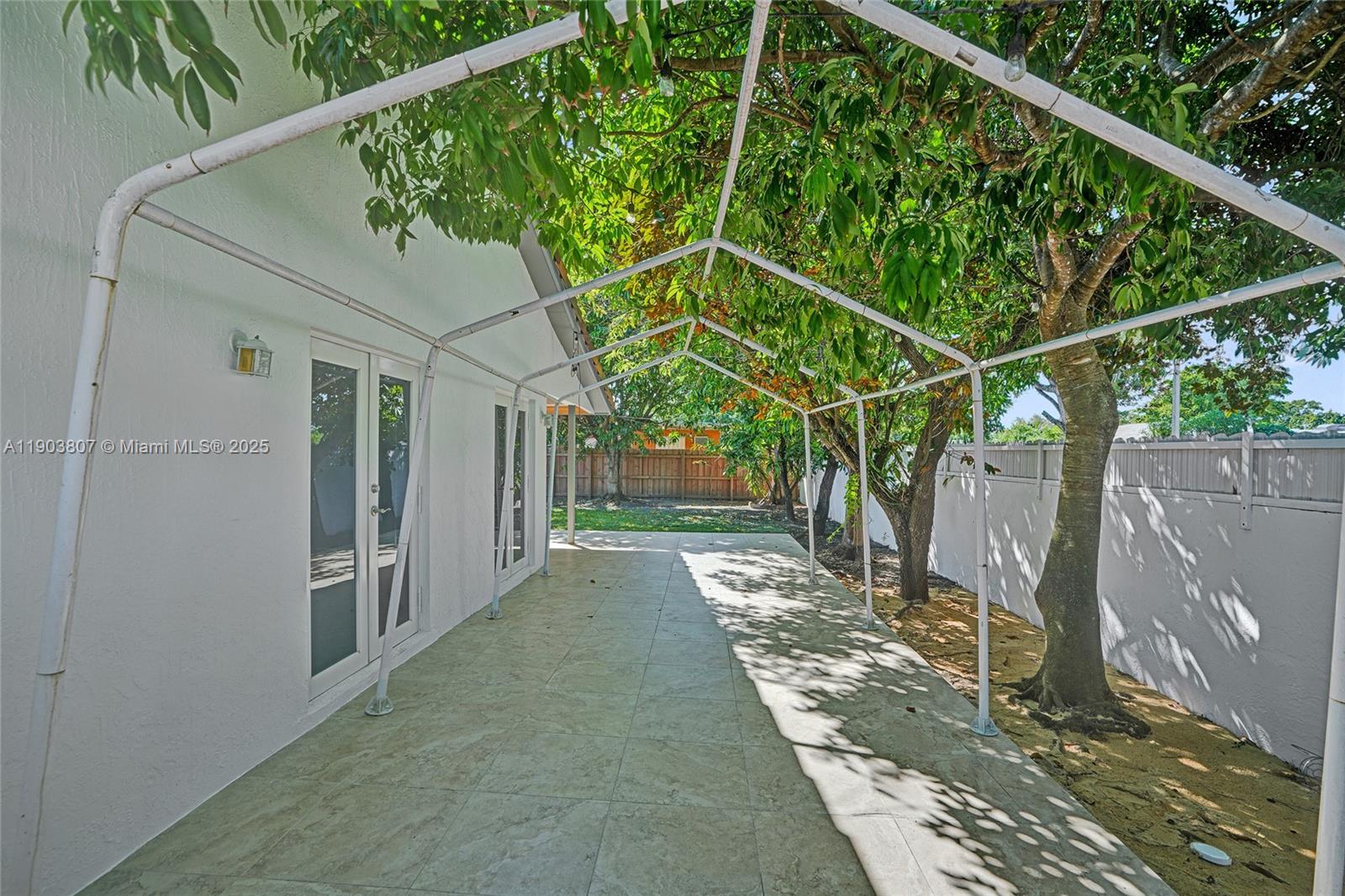 11482 Southwest 181st Street Miami, FL 33157 - Photo 31 of 35 a view of a house with a street