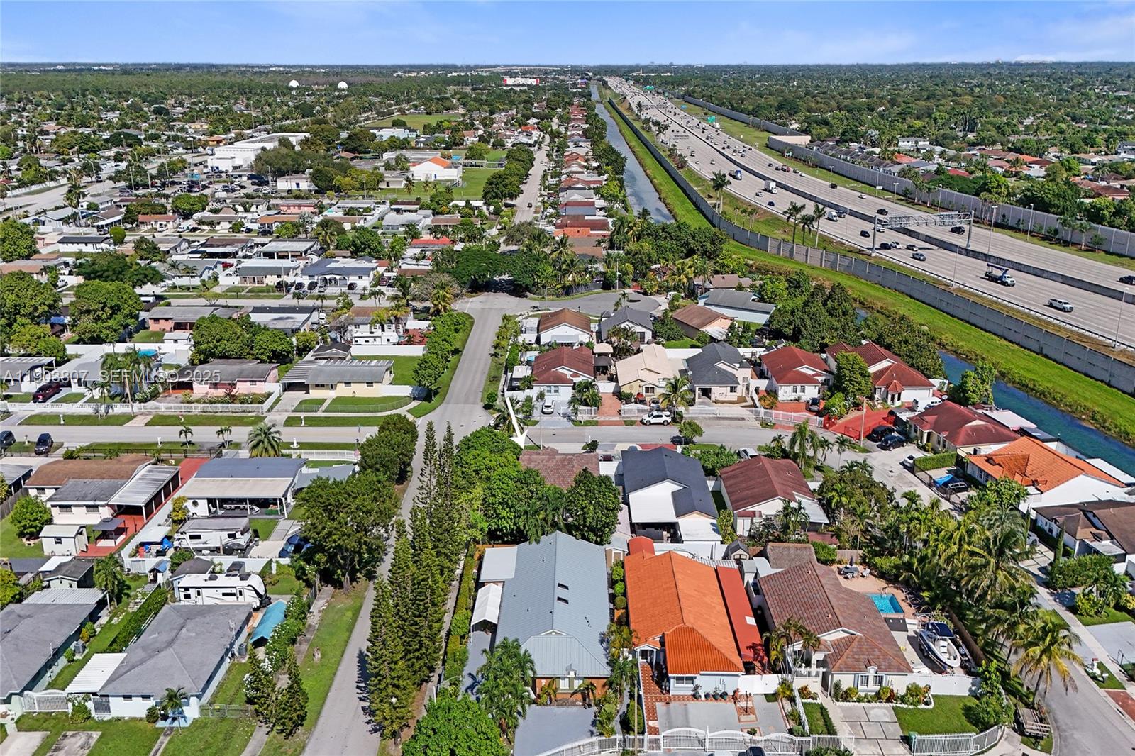 11482 Southwest 181st Street Miami, FL 33157 - Photo 32 of 35 an aerial view of residential houses with outdoor space