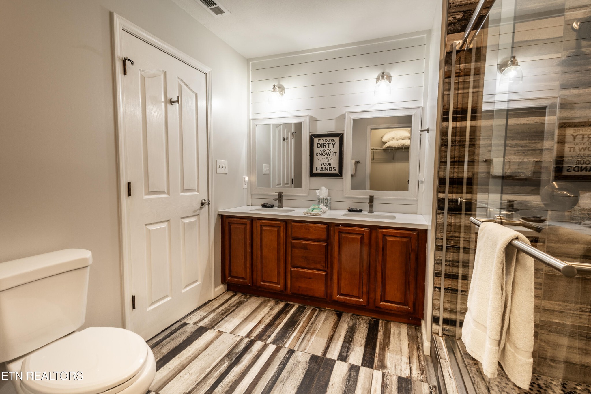 342 Meriwether Way Sevierville, TN 37863 - Photo 12 of 21 a bathroom with a sink a toilet and shower