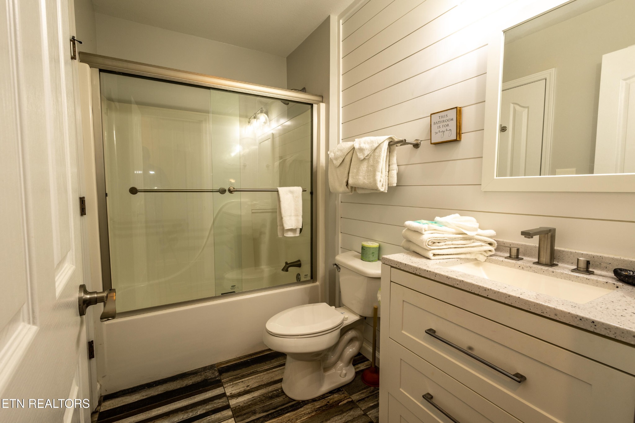 342 Meriwether Way Sevierville, TN 37863 - Photo 13 of 21 a bathroom with a granite countertop sink toilet and shower