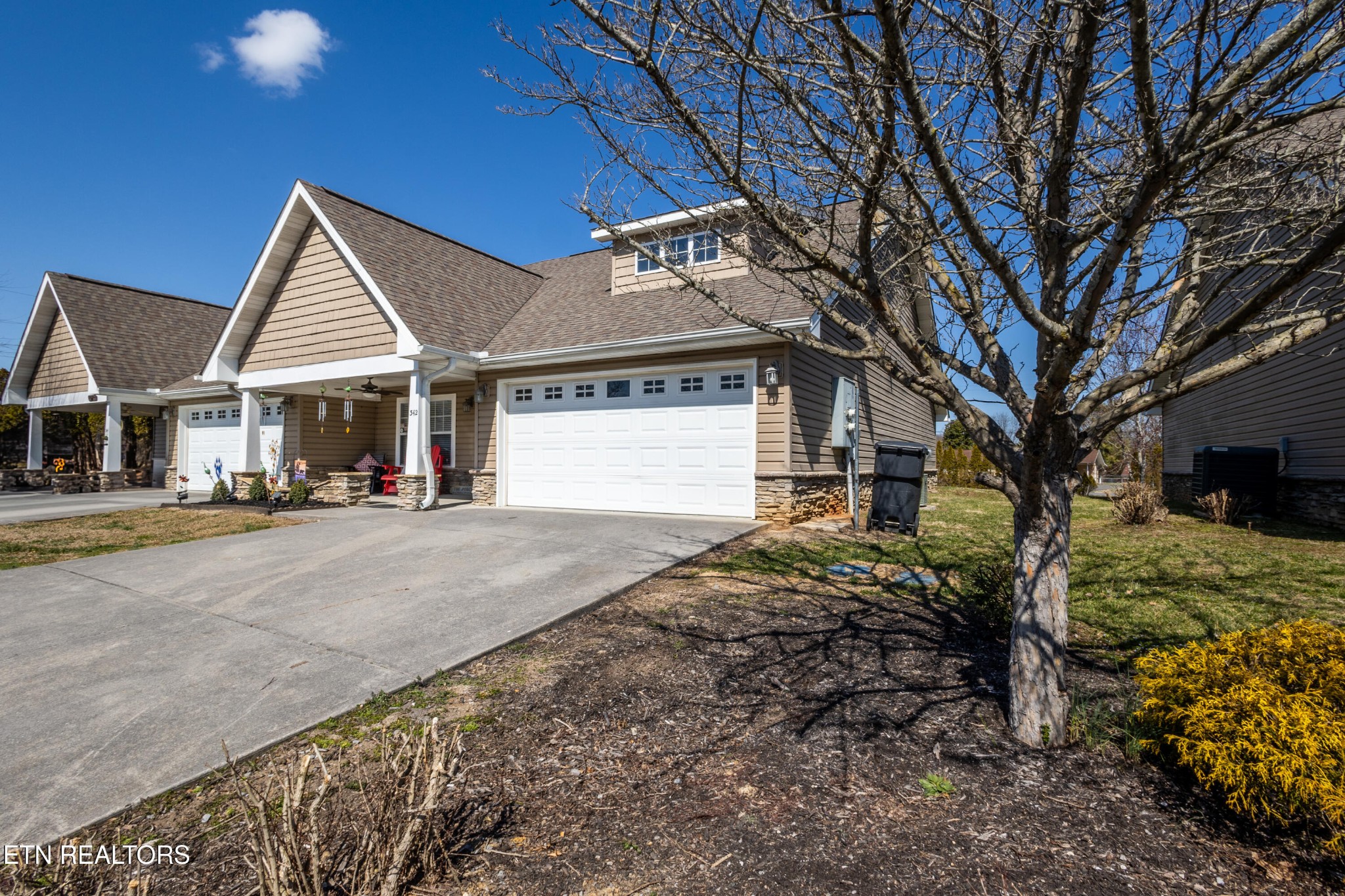 342 Meriwether Way Sevierville, TN 37863 - Photo 19 of 21 a view of a house with a yard