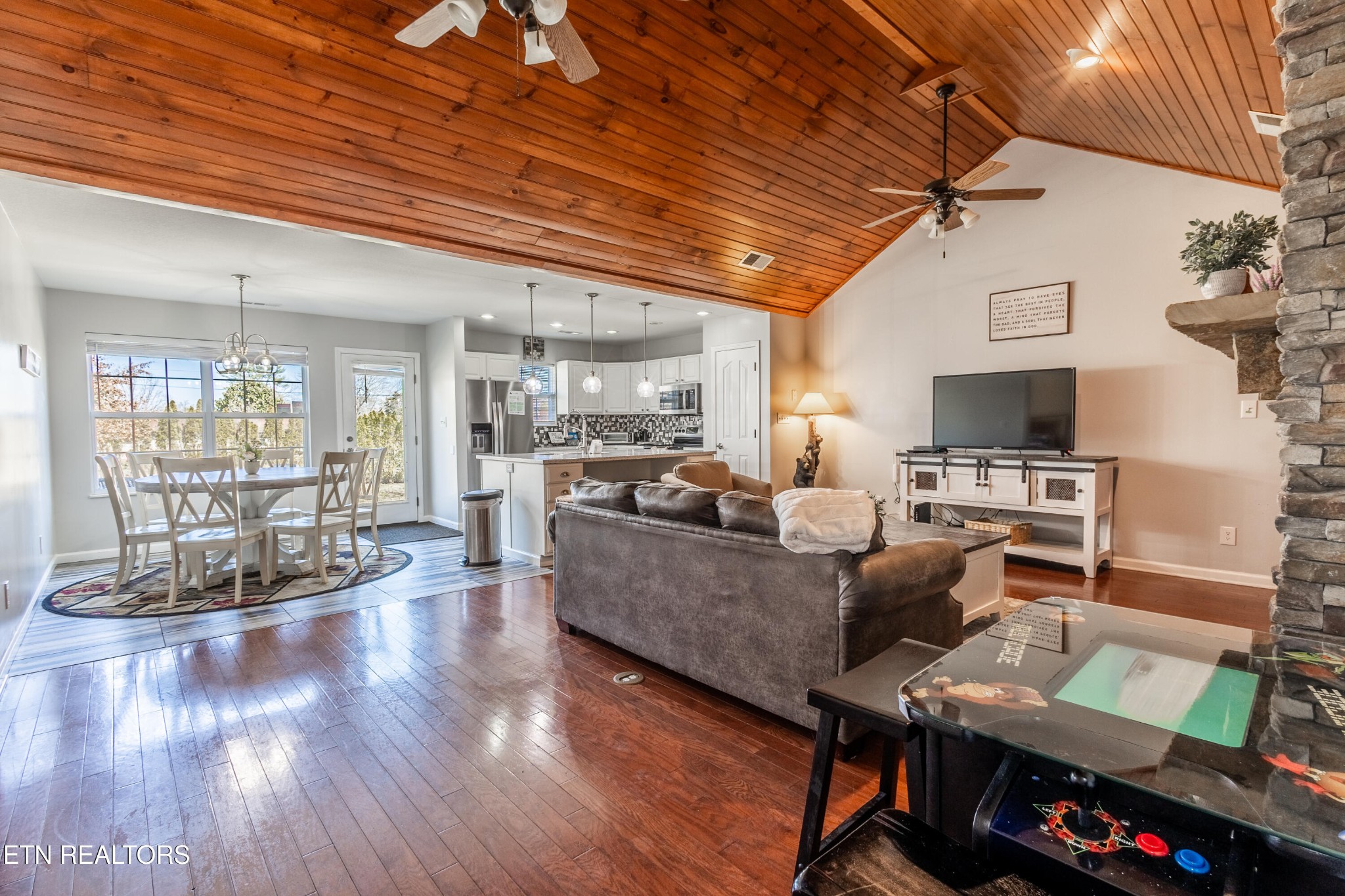 342 Meriwether Way Sevierville, TN 37863 - Photo 2 of 21 a living room with furniture and a flat screen tv