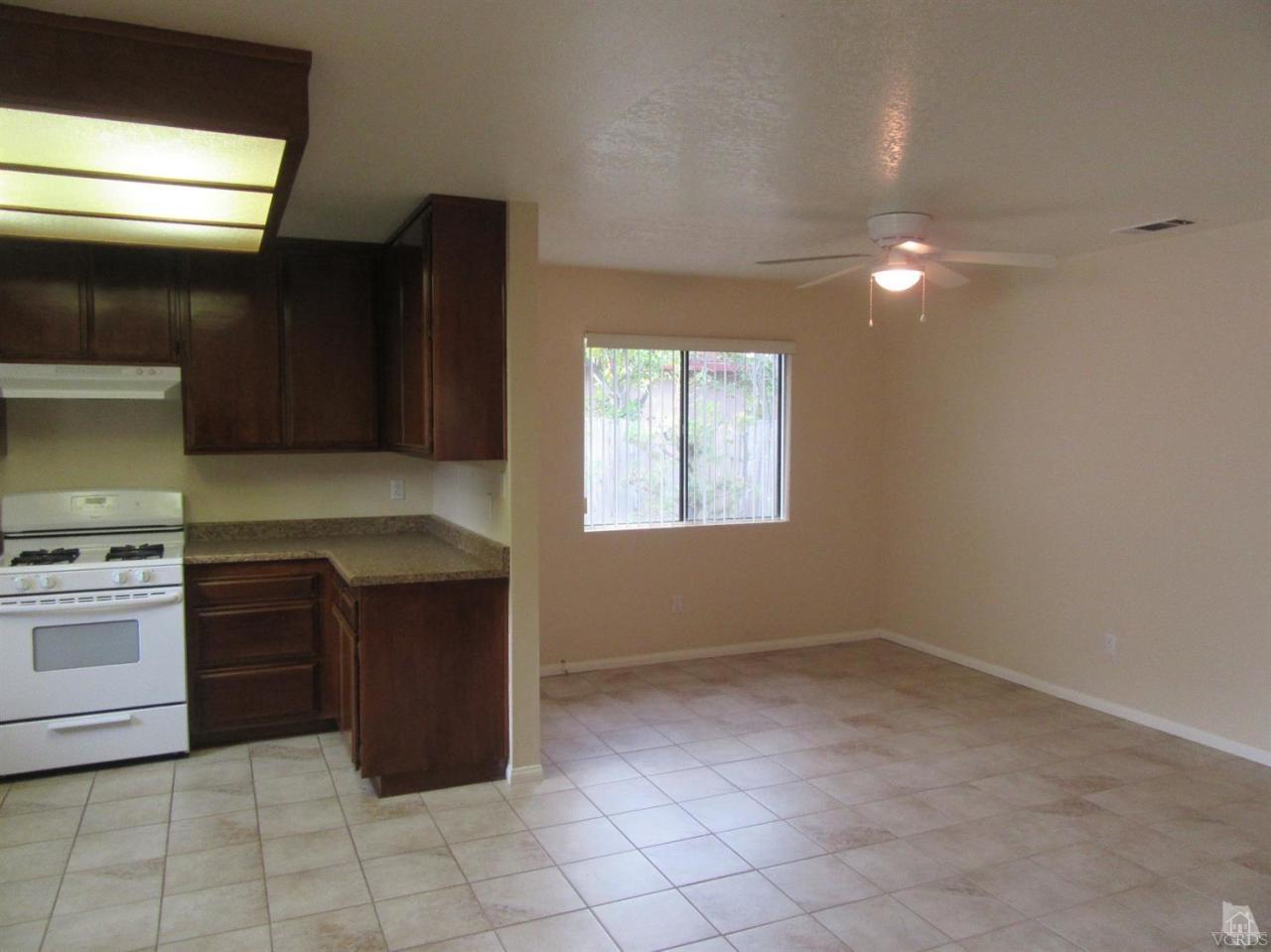 509 Drown Avenue Ojai, CA 93023 - Photo 4 of 17 a kitchen with a stove a sink and a refrigerator
