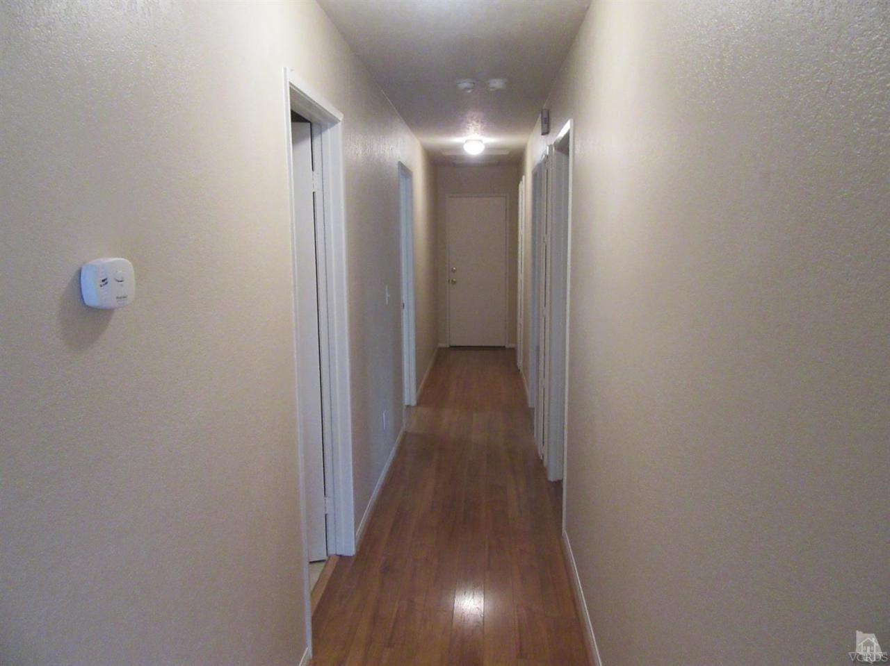 509 Drown Avenue Ojai, CA 93023 - Photo 6 of 17 a view of a hallway with wooden floor
