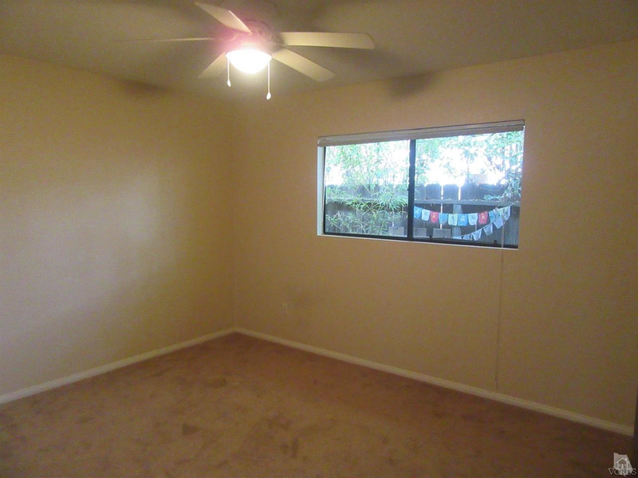 509 Drown Avenue Ojai, CA 93023 - Photo 10 of 17 an empty room with windows and fan