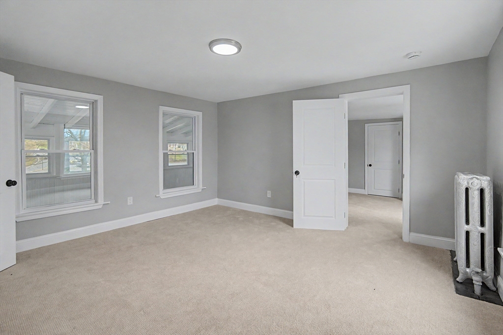 122 Chapin Road Hudson, MA 01749 - Photo 16 of 20 a view of empty room with windows