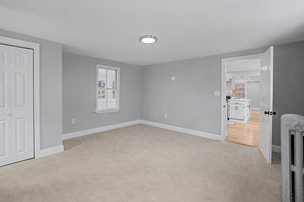 122 Chapin Road Hudson, MA 01749 - Photo 8 of 20 a view of empty room with windows