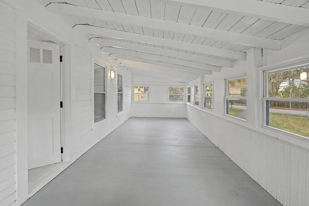122 Chapin Road Hudson, MA 01749 - Photo 10 of 20 a view of empty room with large windows