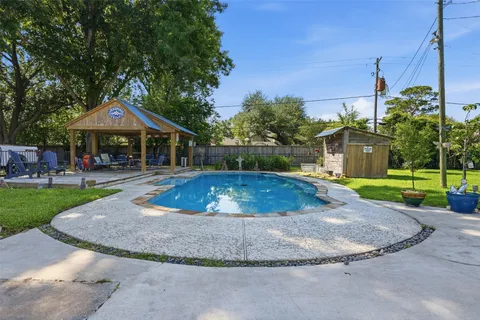 a view of a house with a swimming pool